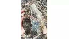 తెలంగాణలో లక్షల ఏళ్ల నాటి రాతి గొడ్డలి లభ్యం