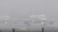 కమ్మేసిన పొగమంచు..గాల్లోనే తిరిగిన విమానం