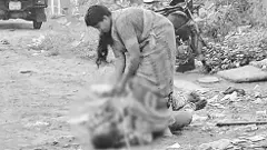 భర్తకు బహిరంగ ఉరి..కసి తీర్చుకున్న భార్య