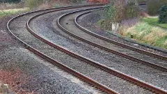 రైల్వే ట్రాక్ పై కారులో యువతి  రాష్ డ్రైవ్ చేస్తూ...