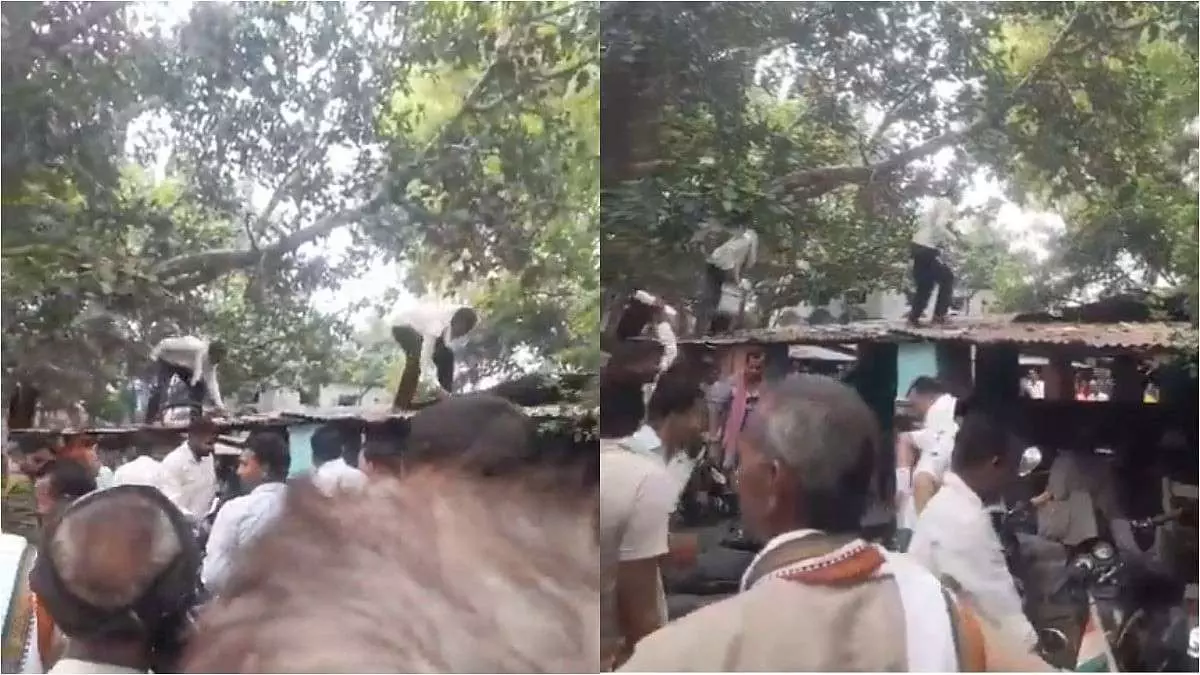 చెట్టు నుంచి రాలిన ఐదొందల నోట్ల కోసం ఎగబడిన జనం.. చెట్టు నుంచి రాలిన ఐదొందల నోట్ల కోసం ఎగబడిన జనం..