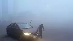 ఢిల్లీ విమానాశ్రయాన్ని కమ్మేసిన పొగమంచు