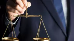 నల్ల కోటు వెనుక....  నలిగిపోతున్న బతుకులు....